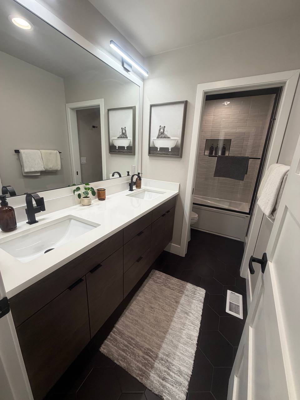 Double sink dark wood vanity bathroom